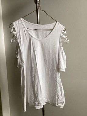 White t-shirt tunic top with criss cross shoulder details